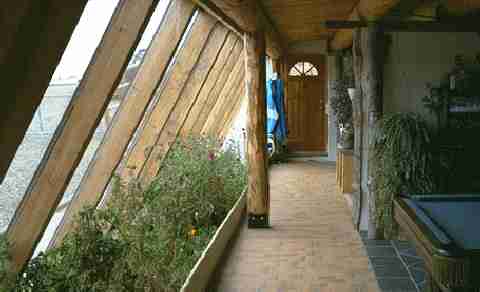 This is an interior planterbed with both roof gutter and greywater recycling, passive, sustainable irrigation systems.