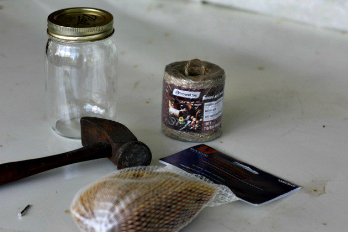 How to Make A DIY Butterfly Feeder | Here's how to make a DIY butterfly feeder that makes a wonderful addition to any garden or flower bed. This simple feeder, made from a mason jar, some twine, and a piece of sponge, will help attract these friendly insects to your garden and give them a place to refuel. | TraditionalCookingSchool.com